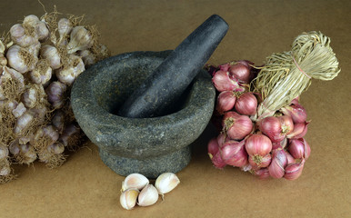 Granite mortar and pestle with garlic