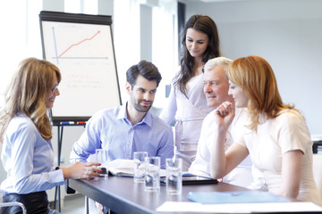 Business people discussing at meeting
