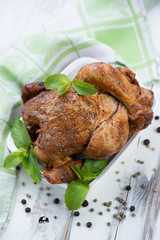 Vertical shot of a smoked chickling with spices, high angle view