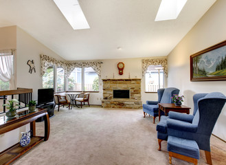 Living room with antique furniture and skylight