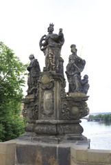 Fototapeta na wymiar Statues of saints Barbara, Margaret and Elizabeth. Charles Bridg