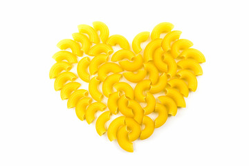 Raw macaroni heart shaped.