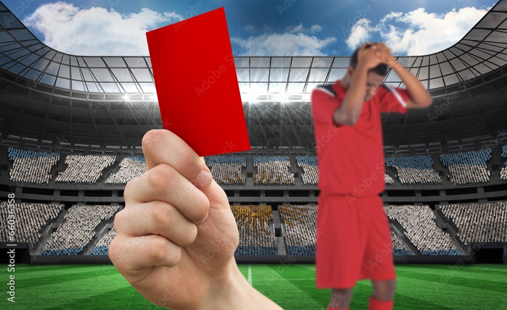 Poster composite image of hand holding up red card to player