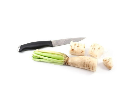 Daikon radishes with knife