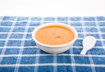 Tortilla Soup with Spoon on Blue Towel