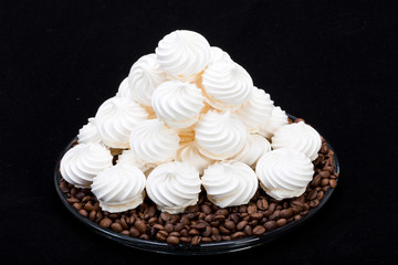 French vanilla meringue cookies and  coffee beans
