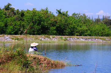 Fishermen using fishing rod