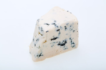 piece of blue cheese on white background