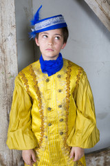 young boy dressed as a prince