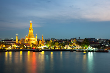 The beautiful temple along the Chao Phraya river at twilight