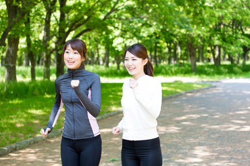 young asian women jogging in the park