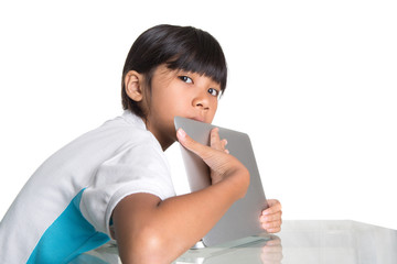 Young Asian school girl protecting hiding her computer screen