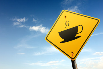Coffee break ahead. Yellow traffic sign.