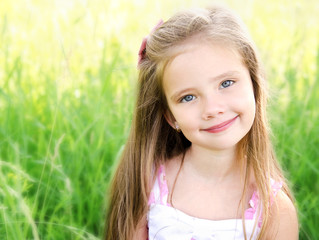 Portrait of adorable smiling little girl