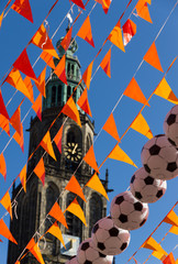 Orange flags and footballs during world soccer cup