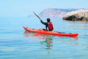 Kayak. People kayaking in the ocean. Active people. Sport