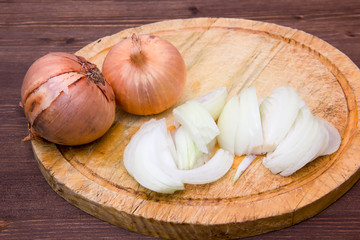 Cut onion on wood