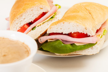 Panini sandwich with ham, cheese and tomato