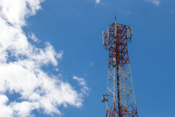 Mobile phone pole with blue sky and cloud
