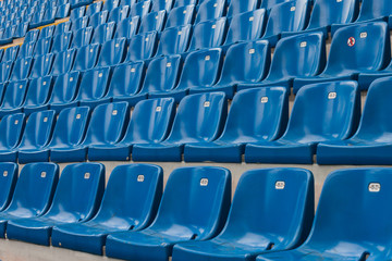 Perspective of many empty stadium seats