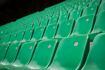 Perspective of many empty stadium seats
