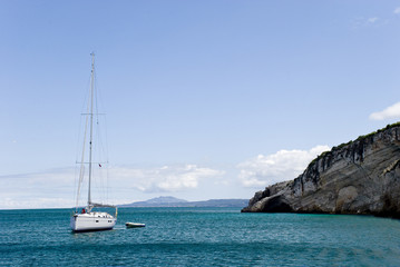 Yacht on the Mediterranean Sea at coast of Greece.
