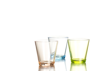 Three shot glasses on white background