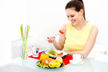 Close-up Of Beautiful Woman Eating healthy food