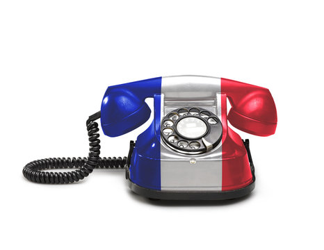 Office: old and vintage telephone with the French flag