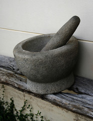 Old granite mortar with pestle