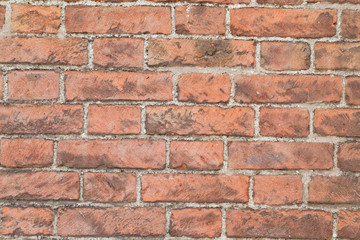 closeup of sunlit red brick wall