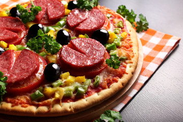 Pizza with Ham, Mushrooms, olives and parsley