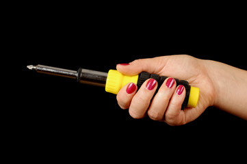 Woman hand holding philips screwdriver