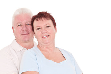 Happy seniors couple in love isolated over white background