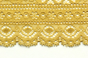 Yellow mesh lace material texture macro shot