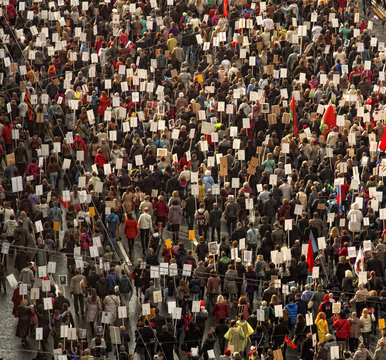 crowd of people demonstrate
