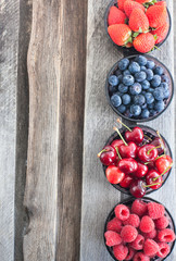 Fresh cherry, strawberry, blueberry and raspberry