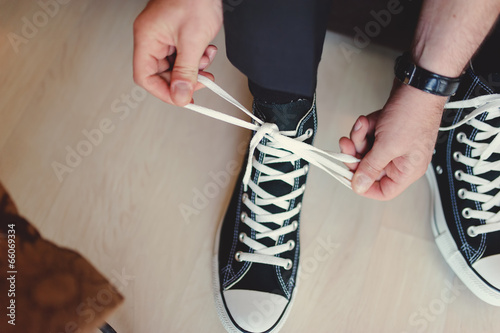 groom in sneakers