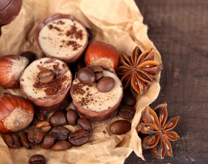 Tasty chocolate candies with coffee beans and nuts