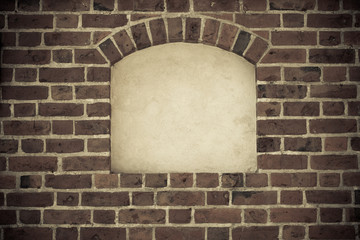 Old arch arc niche with copy space in brick wall background
