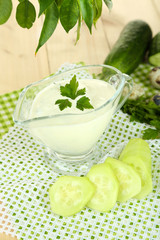 Cucumber yogurt in glass bowl,