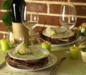 Beautiful holiday Easter table setting in green tones,