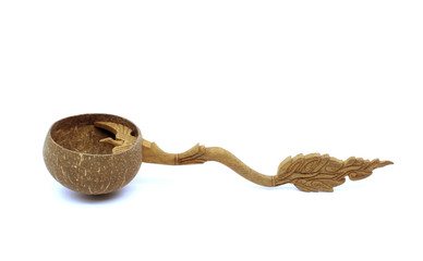 dipper made from Coconut shell on white background