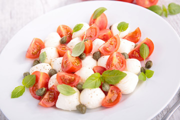 mozzarella with tomato and basil