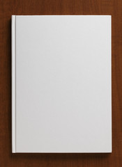 Blank close Book on a wooden table