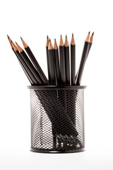 black pencil holder with pencils isolated on white background