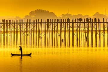 Sunset in U Bein bridge, Myanmar. © SANCHAI