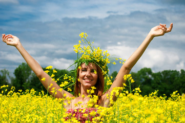 Naklejka premium Beautiful young woman in a raps field