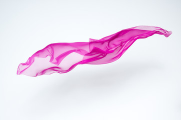 abstract piece of pink fabric flying