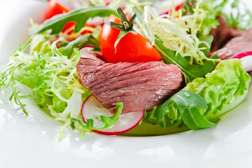fresh salad with greens and meat